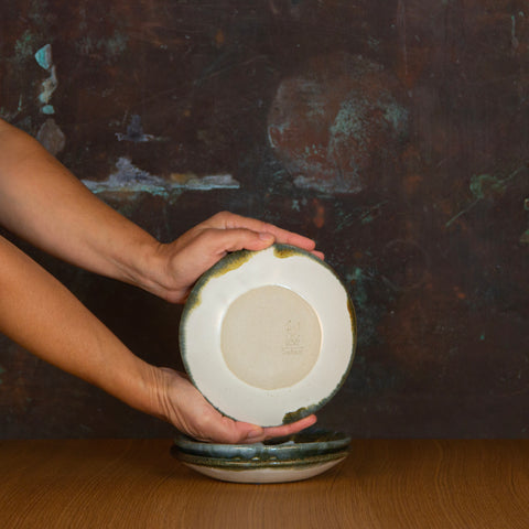 Bottom of Handmade Dessert Bowl Glazed in Inkblot: Elegant Plate with Striking Black Rim