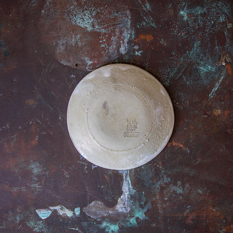 Circular texture on bottom of Dessert plate