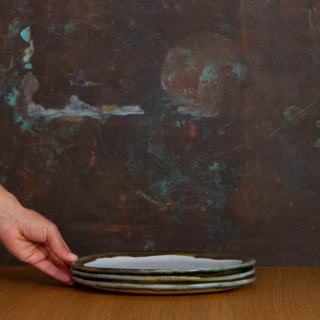 Stack of three Handmade Dinner Plates Glazed in Inkblot: Elegant White Plate with Striking Black Rim