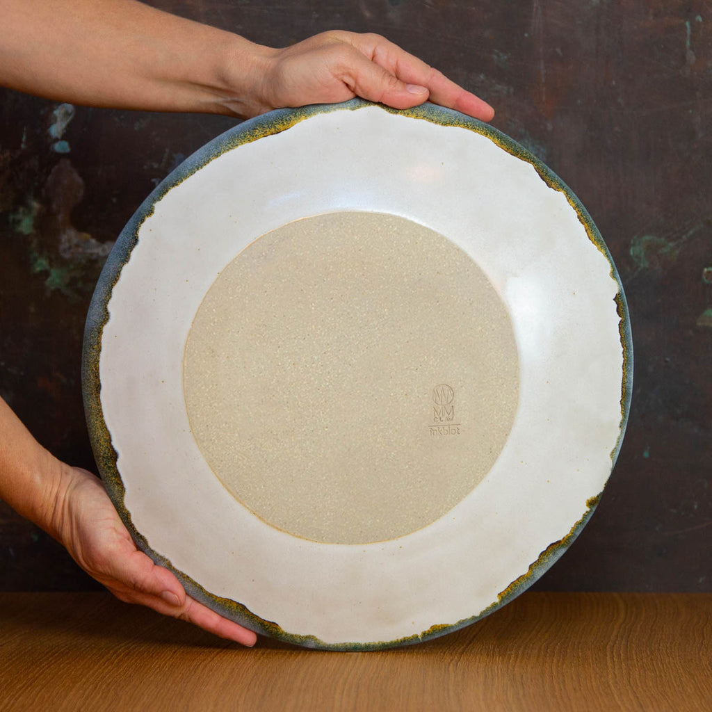 Bottom of Handmade Serving Platter Glazed in Inkblot: Elegant Large White Plate with Striking Black Rim