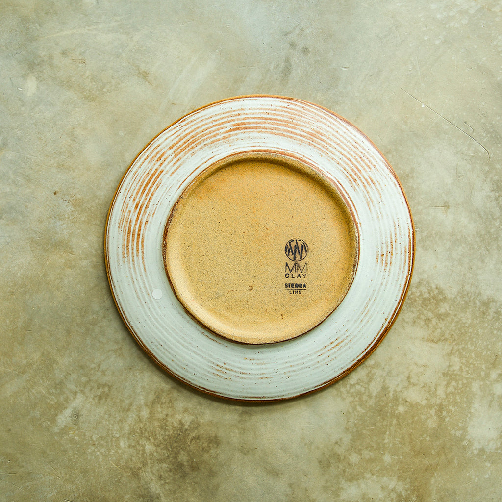 Back of a Sierra Salad plate, displaying the circular ribbed pattern